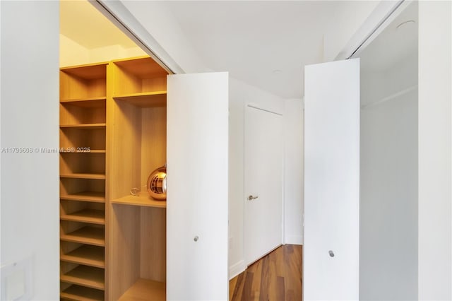 901 Brickell Key Blvd Unit 607, Miami, FL 33131 - unfurnished bedroom featuring wood finished floors