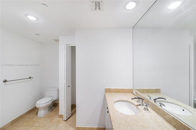 901 Brickell Key Blvd Unit 607, Miami, FL 33131 - full bathroom featuring toilet, vanity, tile patterned floors, and recessed lighting