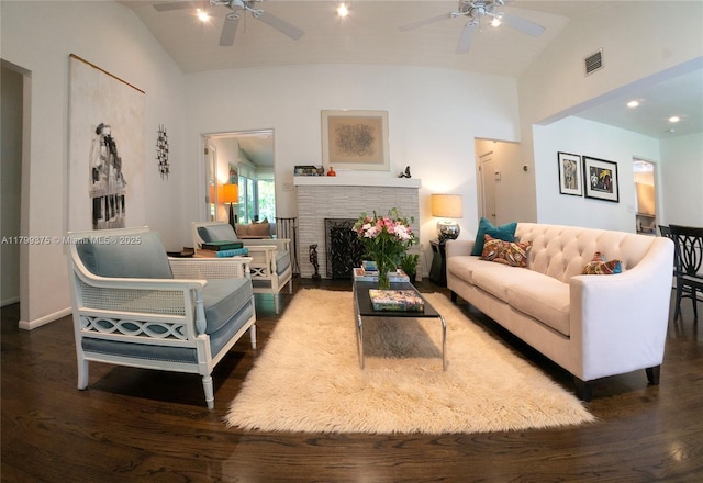 246 NE 92nd St, Miami Shores, FL 33138 - living room with ceiling fan, vaulted ceiling, wood finished floors, a fireplace with flush hearth, and baseboards