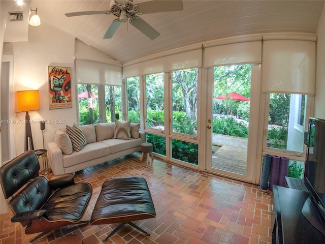 246 NE 92nd St, Miami Shores, FL 33138 - sunroom / solarium with vaulted ceiling, healthy amount of natural light, and brick patterned floors