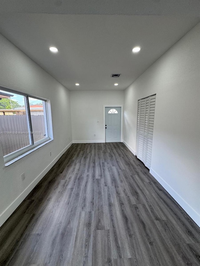 3039 NW 51st Ter, Miami, FL 33142 - empty room with recessed lighting, dark wood-style floors, and baseboards