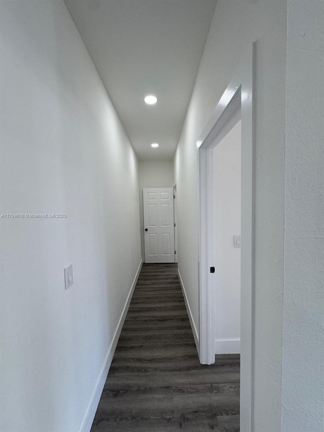 3039 NW 51st Ter, Miami, FL 33142 - hall with baseboards, dark wood-type flooring, and recessed lighting