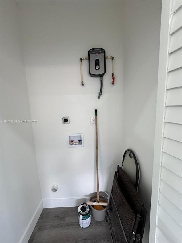 3039 NW 51st Ter, Miami, FL 33142 - laundry area with washer hookup, baseboards, wood finished floors, and electric dryer hookup