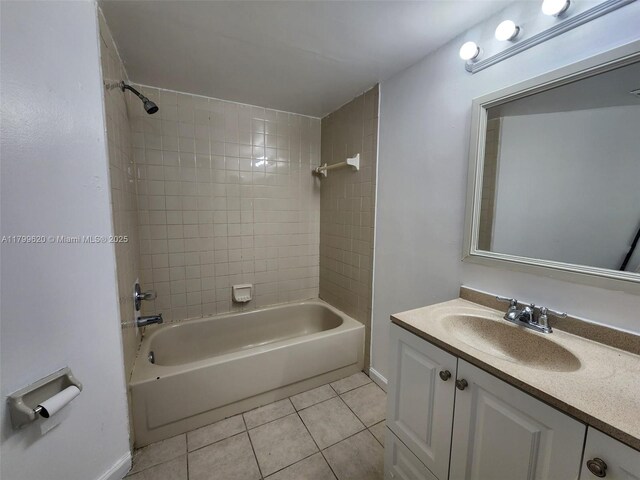 216 Lake Pointe Dr Unit 128, Oakland Park, FL 33309 - full bath featuring tile patterned floors, washtub / shower combination, and vanity