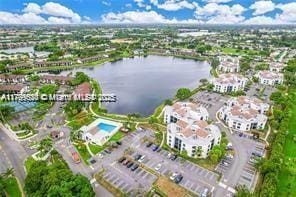 216 Lake Pointe Dr Unit 128, Oakland Park, FL 33309 - aerial view of property's location with a nearby body of water