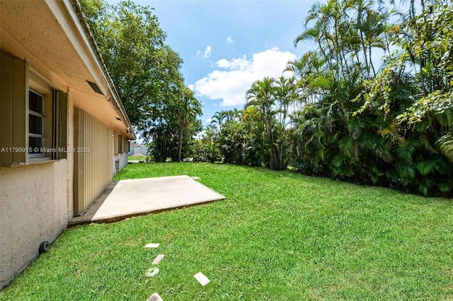 10840 NW 40th St, Coral Springs, FL 33065 - view of green lawn featuring a patio area