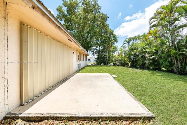 10840 NW 40th St, Coral Springs, FL 33065 - view of green lawn featuring a patio