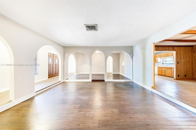 10840 NW 40th St, Coral Springs, FL 33065 - unfurnished living room featuring wood finished floors and baseboards
