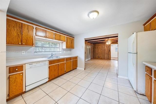10840 NW 40th St, Coral Springs, FL 33065 - kitchen with white appliances, a sink, light countertops, and brown cabinetry
