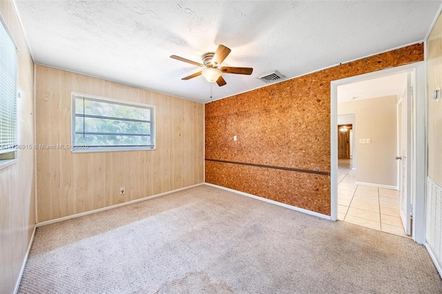 10840 NW 40th St, Coral Springs, FL 33065 - spare room featuring a ceiling fan, carpet floors, and a textured ceiling