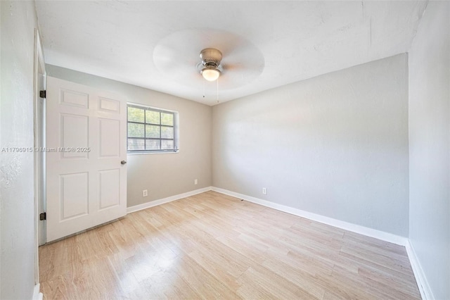 10840 NW 40th St, Coral Springs, FL 33065 - empty room featuring light wood-style flooring, a ceiling fan, and baseboards