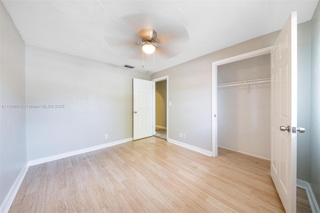 10840 NW 40th St, Coral Springs, FL 33065 - unfurnished bedroom featuring light wood-style floors, baseboards, a closet, and a ceiling fan