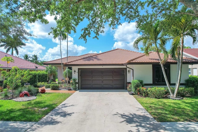 808 Hampton Ct, Weston, FL 33326 - mediterranean / spanish house with a tiled roof, stucco siding, an attached garage, driveway, and a front lawn