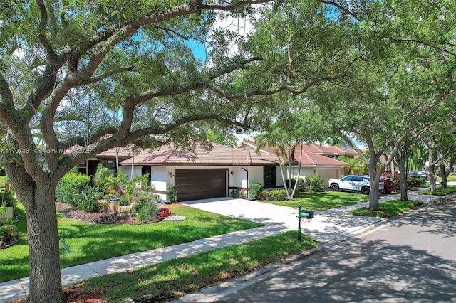 808 Hampton Ct, Weston, FL 33326 - single story home with a garage, a front yard, stucco siding, concrete driveway, and a tile roof