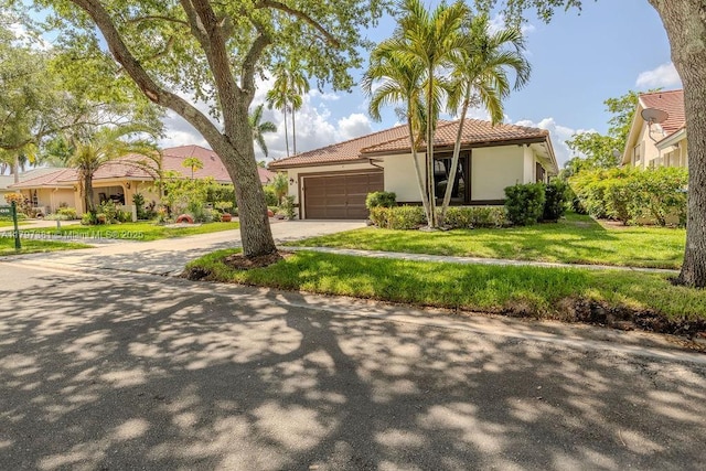 808 Hampton Ct, Weston, FL 33326 - mediterranean / spanish home with stucco siding, a tiled roof, driveway, an attached garage, and a front lawn