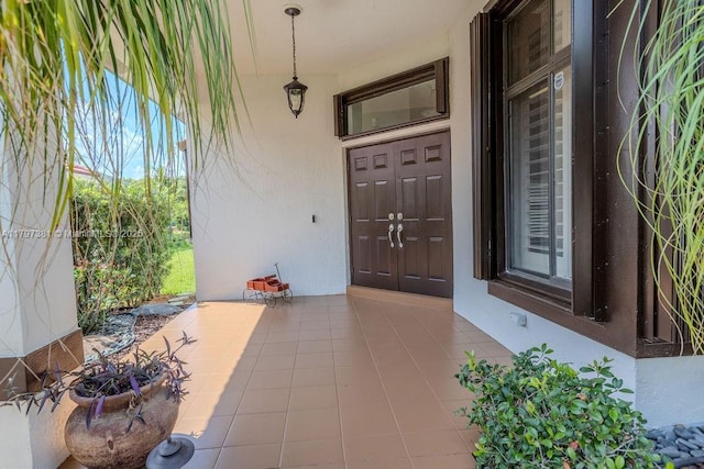 808 Hampton Ct, Weston, FL 33326 - property entrance with stucco siding and covered porch