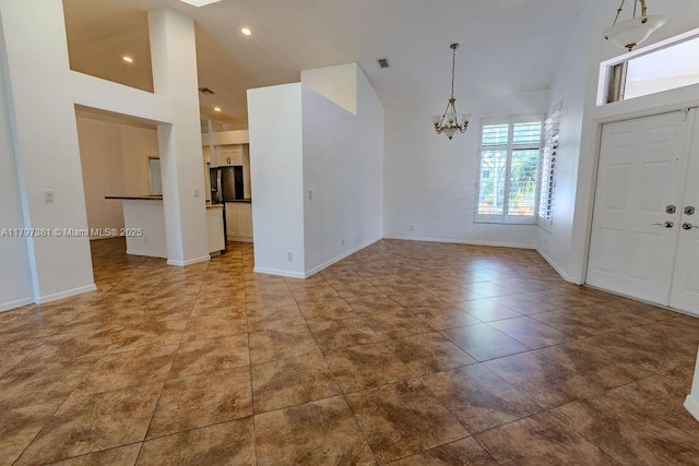 808 Hampton Ct, Weston, FL 33326 - tiled foyer with a chandelier, baseboards, recessed lighting, and high vaulted ceiling