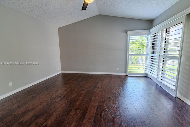 808 Hampton Ct, Weston, FL 33326 - spare room with dark wood-style floors, ceiling fan, vaulted ceiling, a textured ceiling, and baseboards