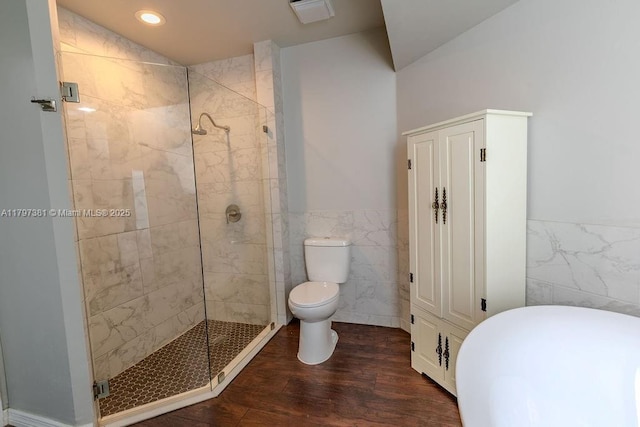 808 Hampton Ct, Weston, FL 33326 - bathroom with tile walls, a stall shower, wood finished floors, wainscoting, and toilet