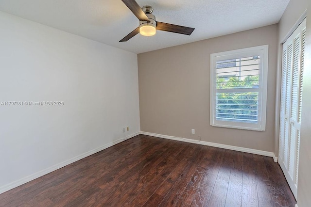 808 Hampton Ct, Weston, FL 33326 - spare room featuring dark wood-type flooring, ceiling fan, and baseboards