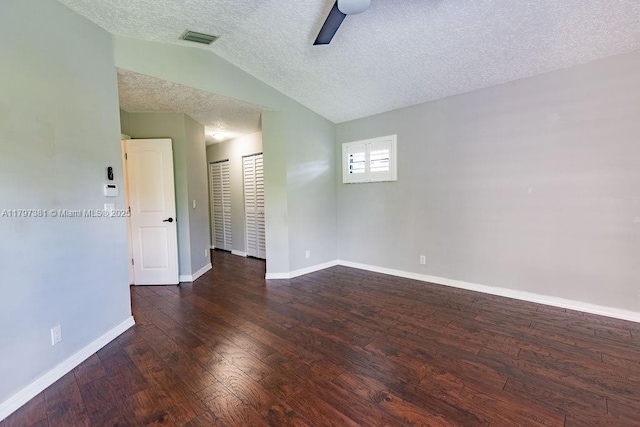 808 Hampton Ct, Weston, FL 33326 - empty room featuring lofted ceiling, a textured ceiling, wood-type flooring, and baseboards