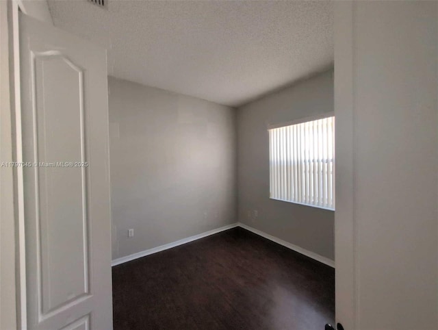 2013 NE 3rd Ct, Homestead, FL 33033 - spare room featuring a textured ceiling and baseboards