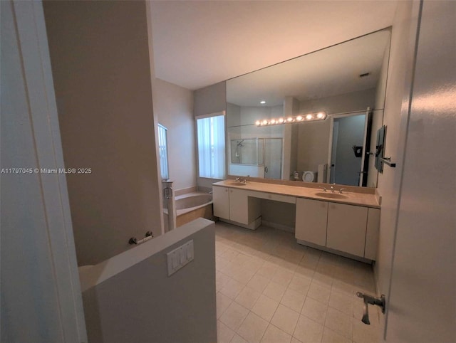 2013 NE 3rd Ct, Homestead, FL 33033 - full bath featuring tile patterned flooring, a stall shower, a garden tub, and two vanities