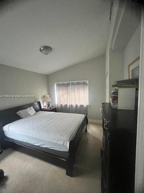 717 NW 1st St, Hallandale Beach, FL 33009 - bedroom with vaulted ceiling
