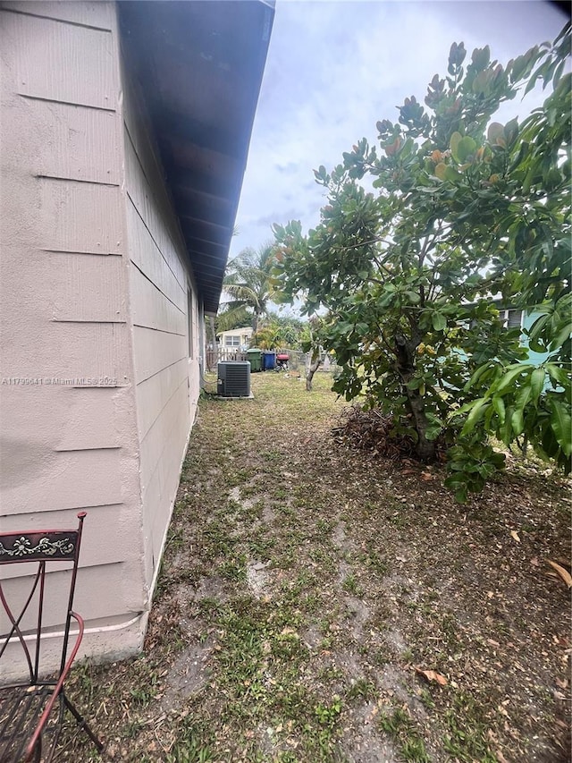 717 NW 1st St, Hallandale Beach, FL 33009 - view of side of property featuring central air condition unit