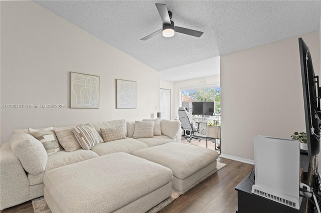 living area with a desk, a ceiling fan, dark wood finished floors, a textured ceiling, and vaulted ceiling