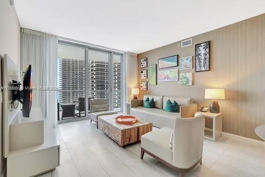 4111 S Ocean Dr Unit 3205, Hollywood, FL 33019 - living room featuring a wall of windows