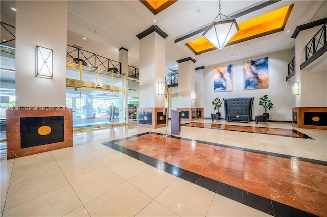 555 NE 15th St Unit 508, Miami, FL 33132 - building lobby featuring a high ceiling and recessed lighting