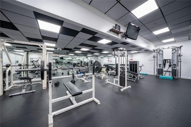 555 NE 15th St Unit 508, Miami, FL 33132 - exercise room featuring a paneled ceiling and baseboards