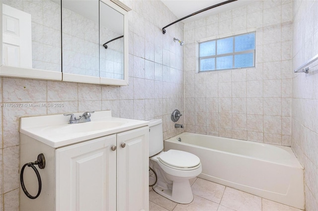 2811 N 66th Ave, Hollywood, FL 33024 - full bath with tile walls, shower / bathtub combination, toilet, tile patterned flooring, and vanity