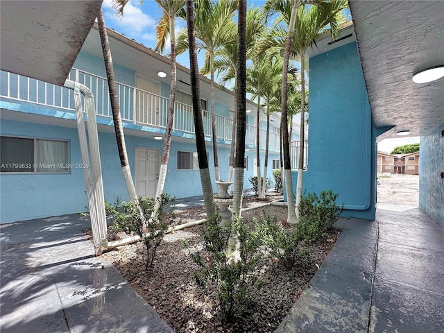 view of property exterior with stucco siding