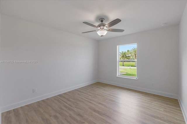 2048 NW 3rd Ter, Cape Coral, FL 33993 - spare room featuring light wood finished floors, baseboards, and a ceiling fan