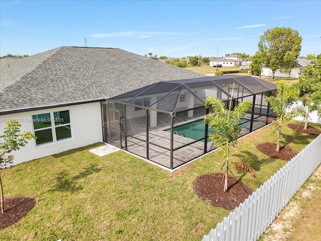 2048 NW 3rd Ter, Cape Coral, FL 33993 - rear view of house featuring a shingled roof, a patio area, an outdoor pool, stucco siding, and glass enclosure
