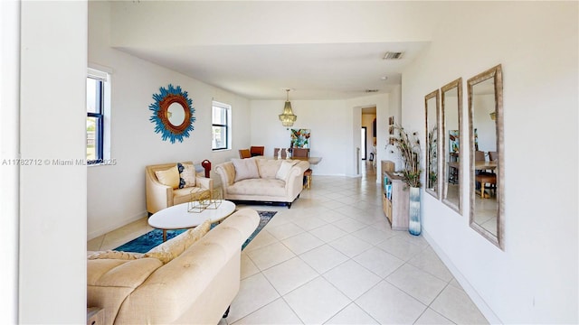 22986 SW 128th Pl, Miami, FL 33170 - living room featuring light tile patterned floors and baseboards