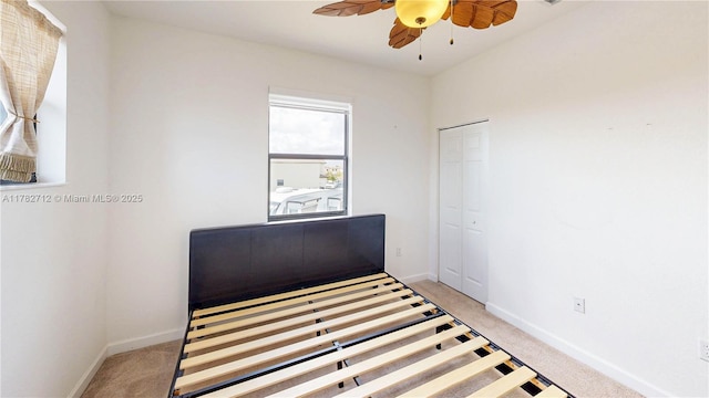 22986 SW 128th Pl, Miami, FL 33170 - unfurnished bedroom with light colored carpet, baseboards, and a closet