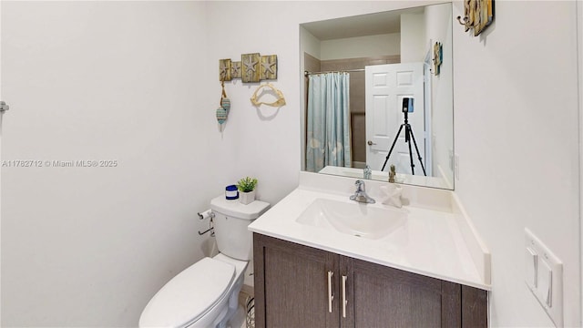 22986 SW 128th Pl, Miami, FL 33170 - bathroom featuring vanity, toilet, and a shower with shower curtain
