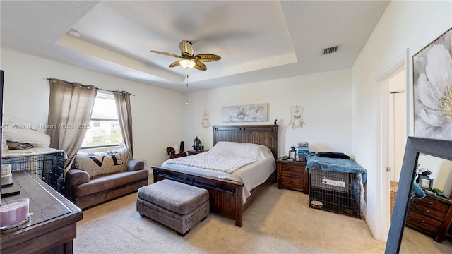 22986 SW 128th Pl, Miami, FL 33170 - bedroom with a raised ceiling, light carpet, and ceiling fan