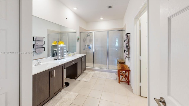 22986 SW 128th Pl, Miami, FL 33170 - full bathroom featuring a stall shower, double vanity, tile patterned flooring, and recessed lighting
