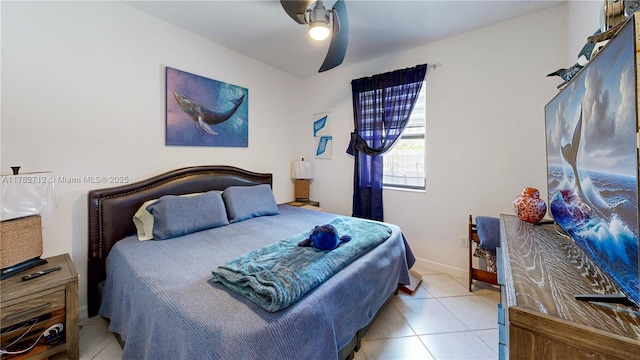 22986 SW 128th Pl, Miami, FL 33170 - bedroom with tile patterned floors, ceiling fan, and baseboards