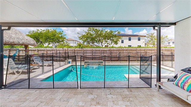 22986 SW 128th Pl, Miami, FL 33170 - view of swimming pool with a patio and a fenced backyard