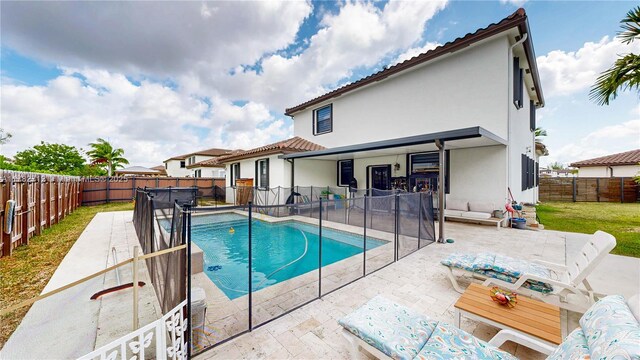 22986 SW 128th Pl, Miami, FL 33170 - view of pool featuring a patio and a fenced backyard