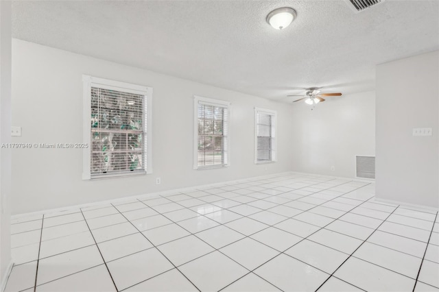 8101 NW 44th Ct, Lauderhill, FL 33351 - spare room featuring ceiling fan and a textured ceiling