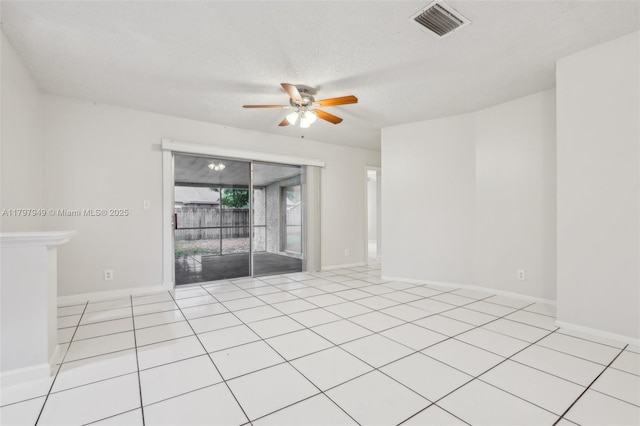 8101 NW 44th Ct, Lauderhill, FL 33351 - tiled empty room with a ceiling fan and a textured ceiling