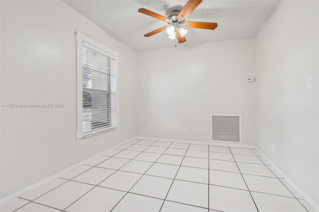 8101 NW 44th Ct, Lauderhill, FL 33351 - unfurnished room with a ceiling fan, a textured ceiling, and light tile patterned floors