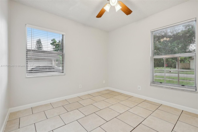 8101 NW 44th Ct, Lauderhill, FL 33351 - empty room featuring ceiling fan and light tile patterned floors