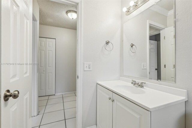 8101 NW 44th Ct, Lauderhill, FL 33351 - bathroom with vanity, tile patterned floors, and a textured ceiling